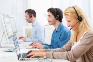 View of a Young attractive woman working in a call center